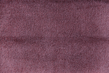 Plum colour velour textile sample. Fabric texture background