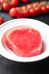 tuna fresh fish raw seafood ready to eat meal snack copy space food background rustic. top view keto or paleo diet pescetarian vegetarian food