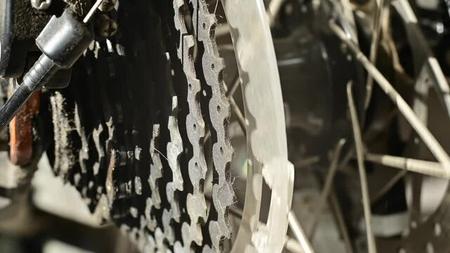 A close-up of the gears of a multi-speed bike