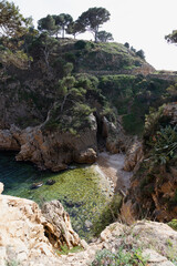 Creek in the mediterranean sea. Small private beach hidden in the rocks