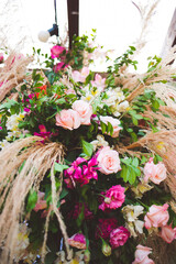 cake table decorated with flowers for wedding