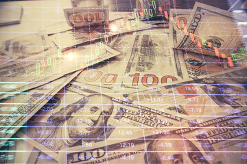 Multi exposure of forex chart drawing over us dollars bill background. Concept of financial success markets.