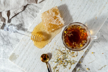 Breakfast tea with honey honeycomb flatlay 