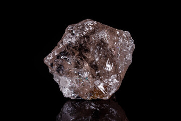 Macro mineral stone smoky quartz Rauch topaz on black background