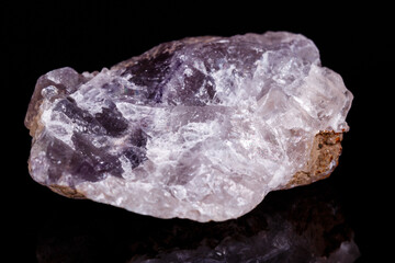 Macro mineral stone Fluorite on black background