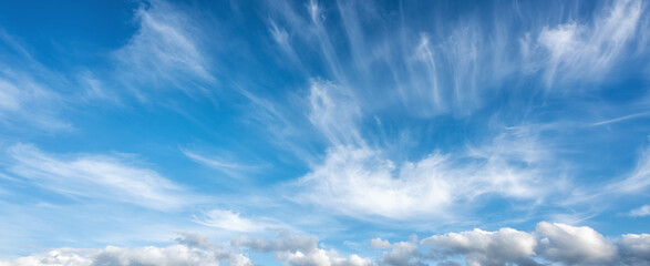 Landscape of a beautiful blue sky covered with cumulonimbus clouds on a winter afternoon. Unspoiled...