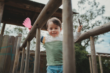 Obraz premium Toddler playing in the park
