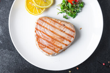 tuna grilled seafood fried barbecue fish second course meal snack  keto or paleo  pescetarian diet vegetarian food copy space food background rustic. top view