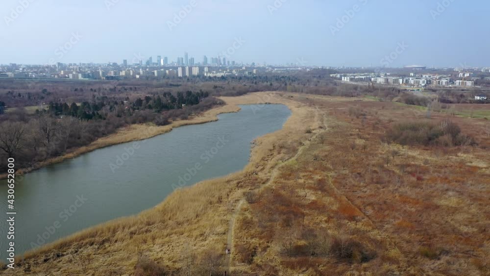 Sticker Drone view of Lake Czerniakowskie Nature Reserve Lake in Warsaw city, Poland, 4k footage