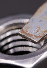 close-up old screwdriver and bolt
