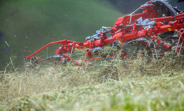 Tedder in an agricultural field