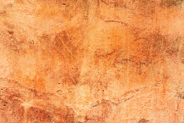 Texture of a concrete wall with cracks and scratches which can be used as a background