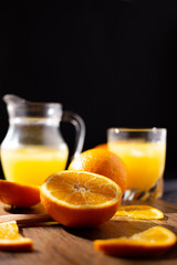 table full of fresh oranges and juice in springtime
