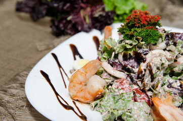 salad of greens and shrimp close up