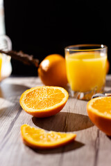 table full of fresh oranges and juice in springtime