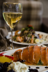 fish salad with white wine in a restaurant