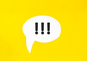 three exclamation marks speech bubble isolated on the yellow background. Business concept