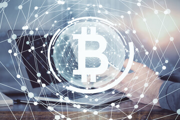 Double exposure of man's hands holding and using a phone and crypto currency blockchain theme drawing.