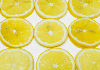 yellow lemons photographed macro shooting on a white background