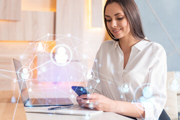 Attractive businesswoman in white shirt using smart phone to check new candidates for international business consulting. HR, social media icons over modern office background.