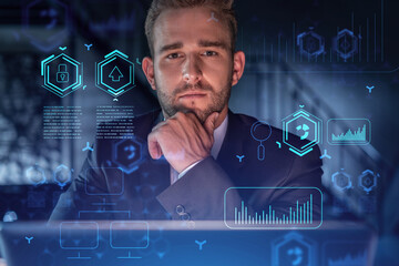 Portrait of handsome businessman in formal suit thinking how to optimize business process by...