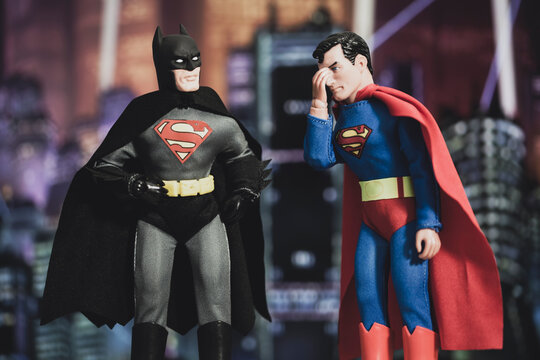 NEW YORK, USA, APRIL 27 2021: Mashup of DC Comic superheroes Batman and Superman, Batman wears the Superman S on his chest while Superman facepalms - Mego Corporation action figures