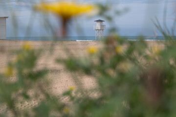 Landscape with a wooden hut for lifeguards in Gandia Beach.