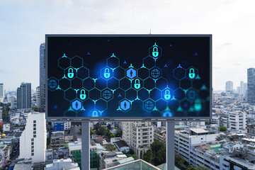 Padlock icon hologram on road billboard over panorama city view of Bangkok at day time to protect...