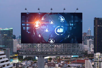 World planet Earth map hologram of social media icons over sunset panoramic cityscape of Bangkok, Southeast Asia. The concept of people connections.