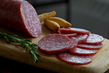 salchichón cured meat with rosemary and crackers