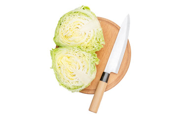 Halved cabbage with knife  on cutting board. Isolated on white.