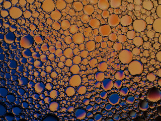Oil bubbles on the water surface