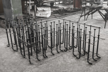 Metal anchor bolts for concrete construction structures, foundation on the background of the...