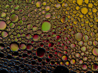 Oil bubbles on the water surface