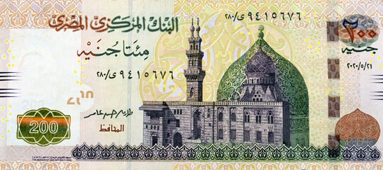 A fragment of the obverse side of 200 Egyptian pounds banknote, obverse side has an image of Mosque...