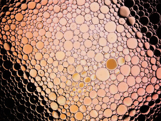 Oil bubbles on the water surface