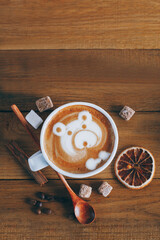 Latte art. Teddy bear made of coffee foam and milk