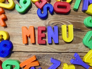 Fototapeta premium Menu (mot en français avec des lettres colorées)