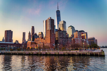 Fototapeta na wymiar city skyline at sunrise New York beautiful cute views summer reflections buildings marina 