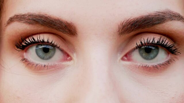 Young woman looking at camera, Italy