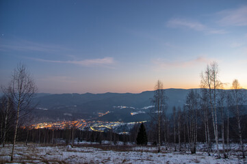 Panorama of the Carpathian mountains in winter at sunset