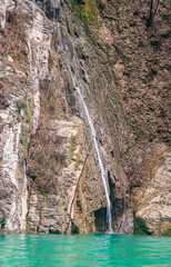 Wushan, China - May 7, 2010: Dawu or Misty Gorge on Daning River. Narrow white waterfall flowing...