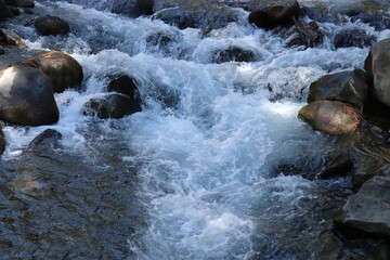 water flowing over rocks