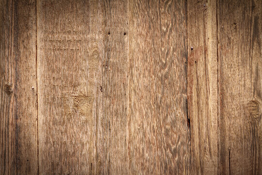 Brown wood surface with texture and vignette