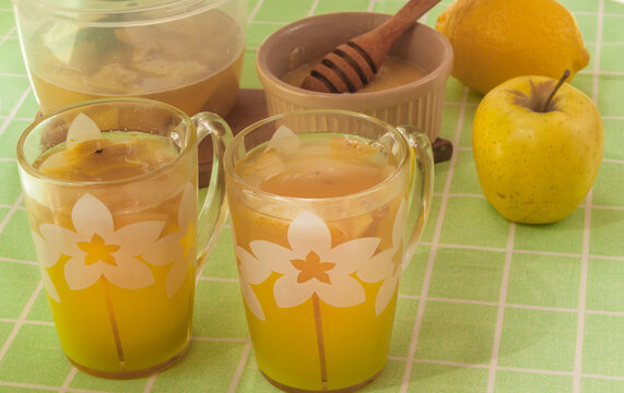 Apple, honey and lemon compote on the table.
