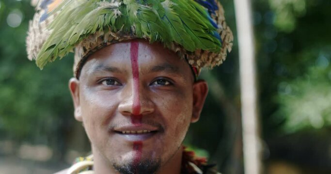 Indian from the Patax&oacute; tribe, with feather headdress. Brazilian Indian. 4K.