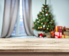 Wooden empty table top on blur christmas background