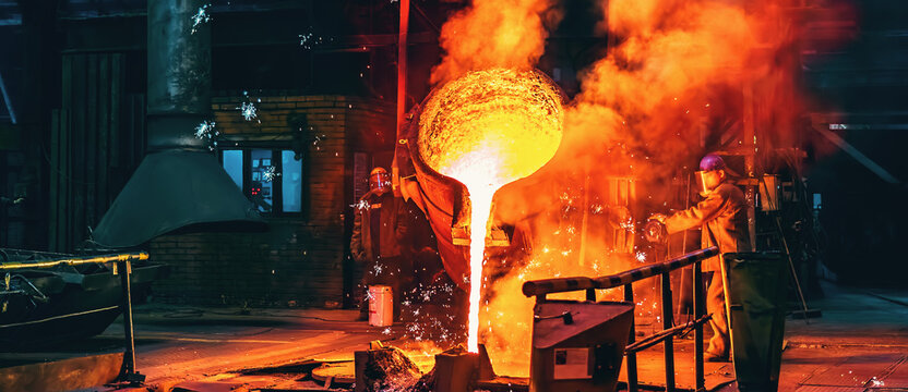 Liquid iron molten metal pouring in container, industrial metallurgical factory, foundry cast, heavy industry background.