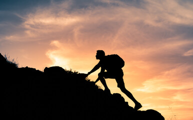 Man climbing hiking up mountain 
