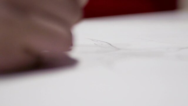 Woman's Hand Making Sketch With Pencil. - Selective Focus Shot